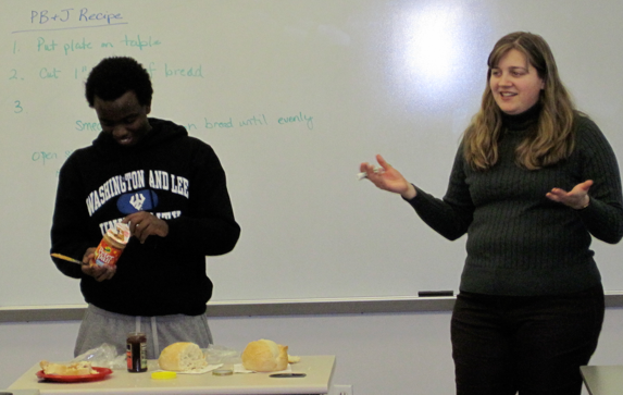 Prof. Sara Sprenkle of Washington and Lee University leading her class though the time-honored PBJ Algorithm example.