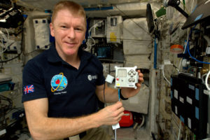 Astronaut Tim Peake with the Sense HAT in orbit aboard the International Space Station